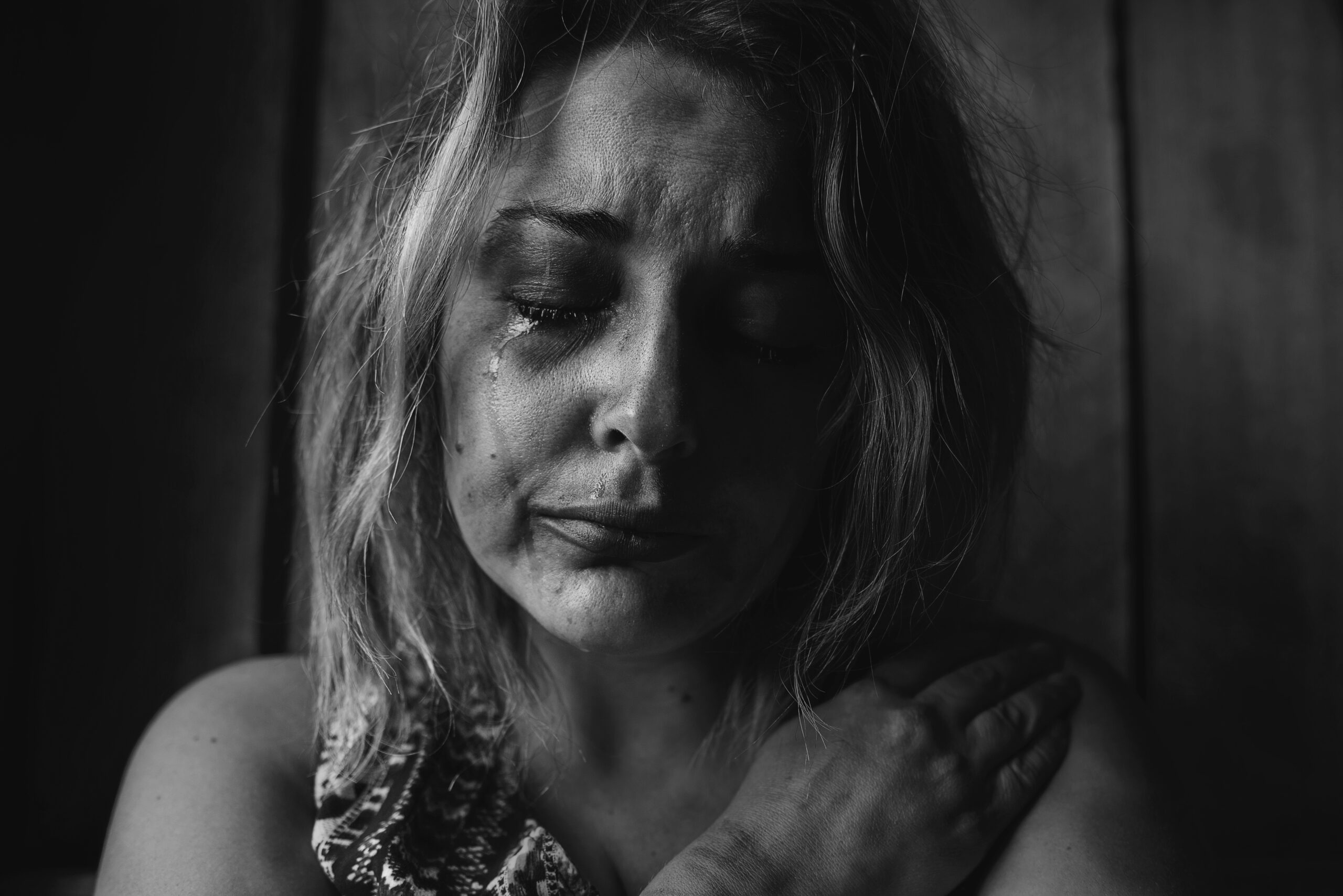 women crying after her attack